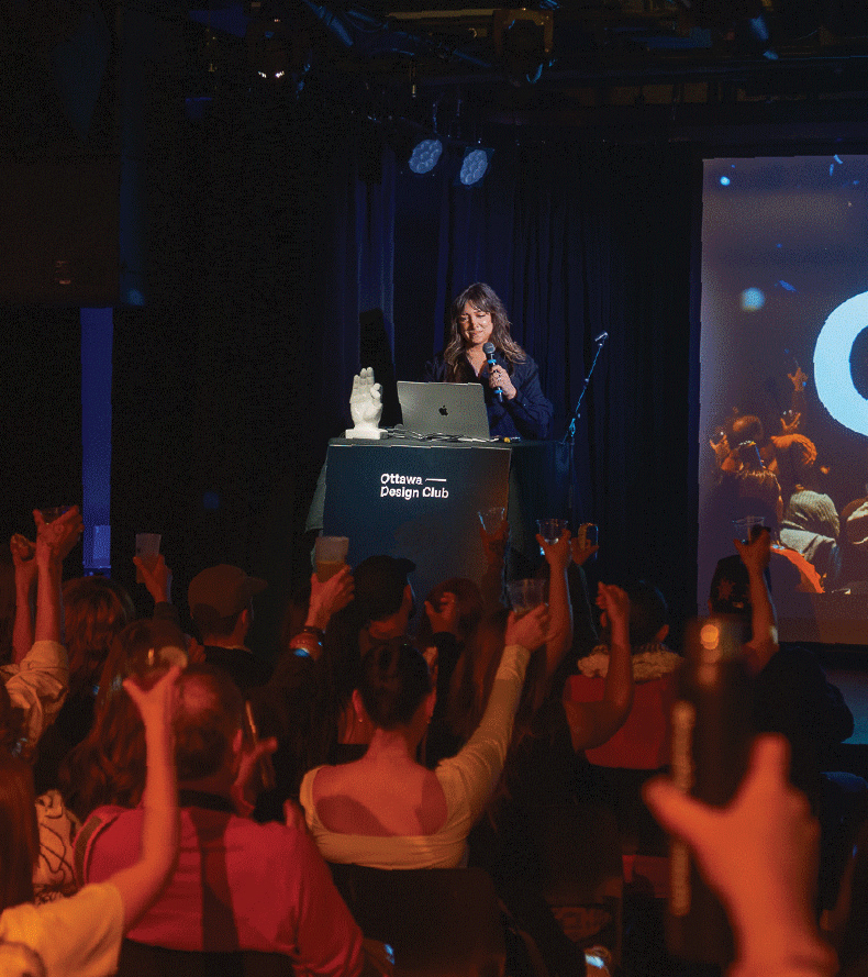 Izzy Poirier speaking at Adobe MAX